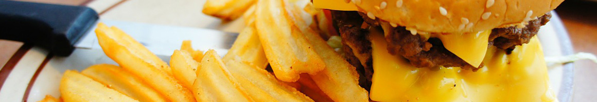 Eating Burger at Edzo's Burger Shop restaurant in Evanston, IL.